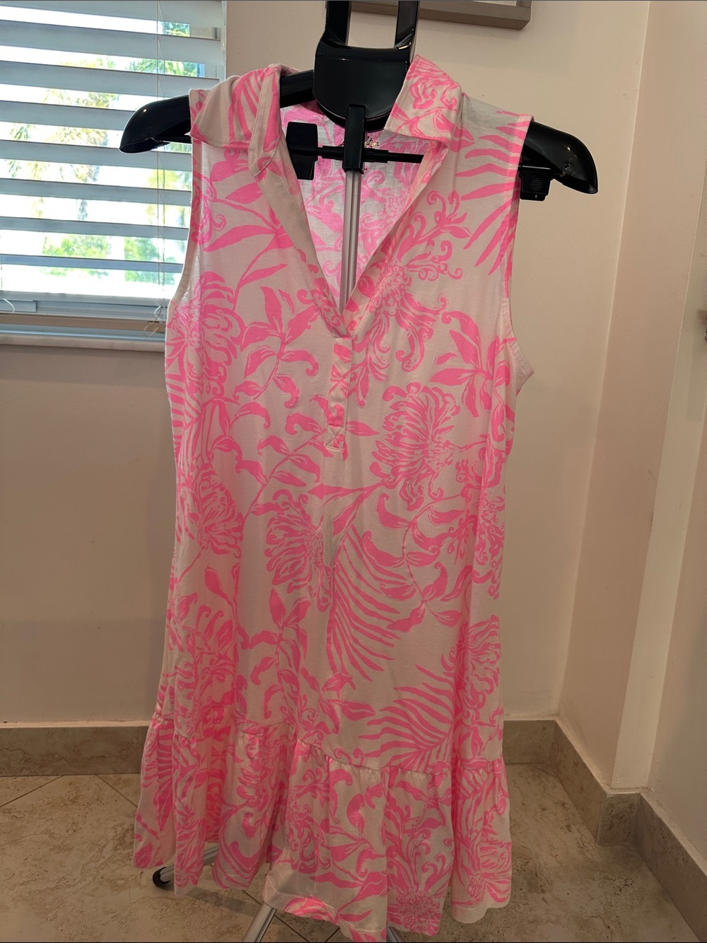 Lilly Pulitzer sleeveless swing dress with a ruffle hem in Pink Tropics Print